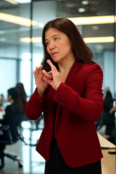 Anna is providing ASL interpreting